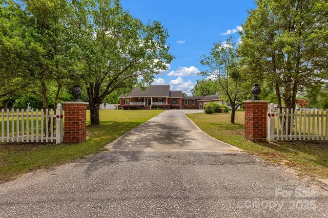 a view of a town with mountains in the background