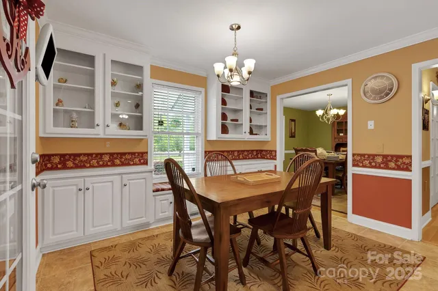 a kitchen with cabinets stainless steel appliances and a counter space