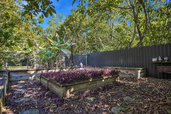 a garden view with a seating space