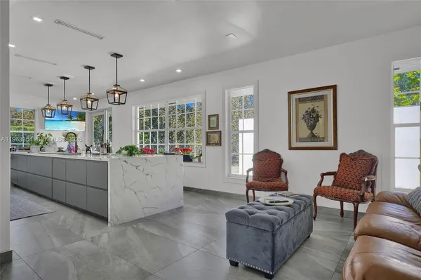 a living room with furniture and a window
