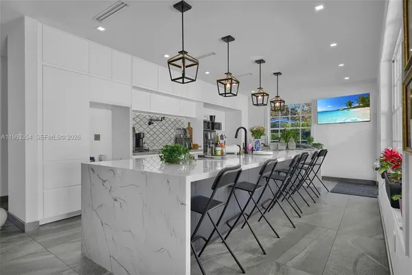 a view of a dining room with furniture