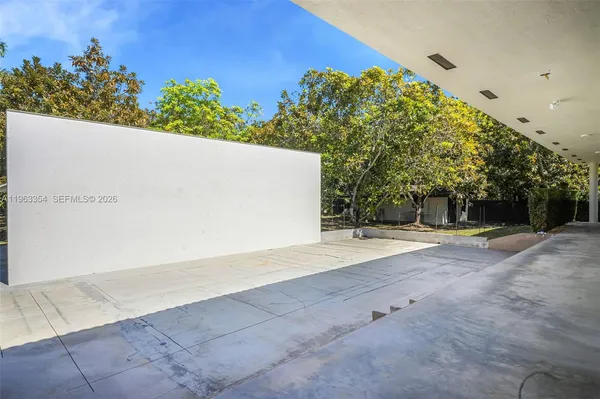 a view of backyard with green space