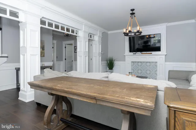 a room with a table and chairs