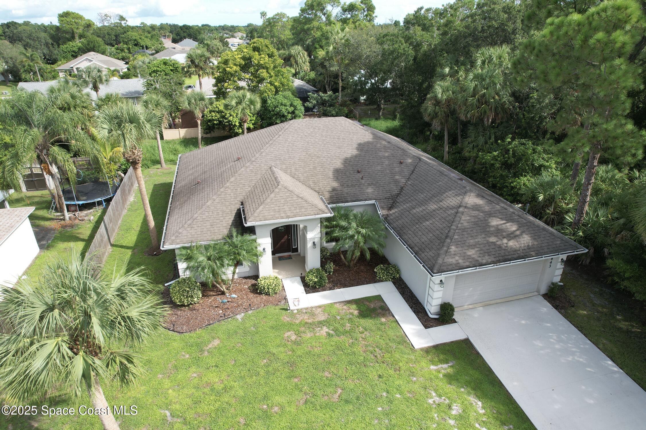 443 Lanfair Avenue Sebastian, FL 32958 - Photo 1 of 33 an aerial view of a house with yard