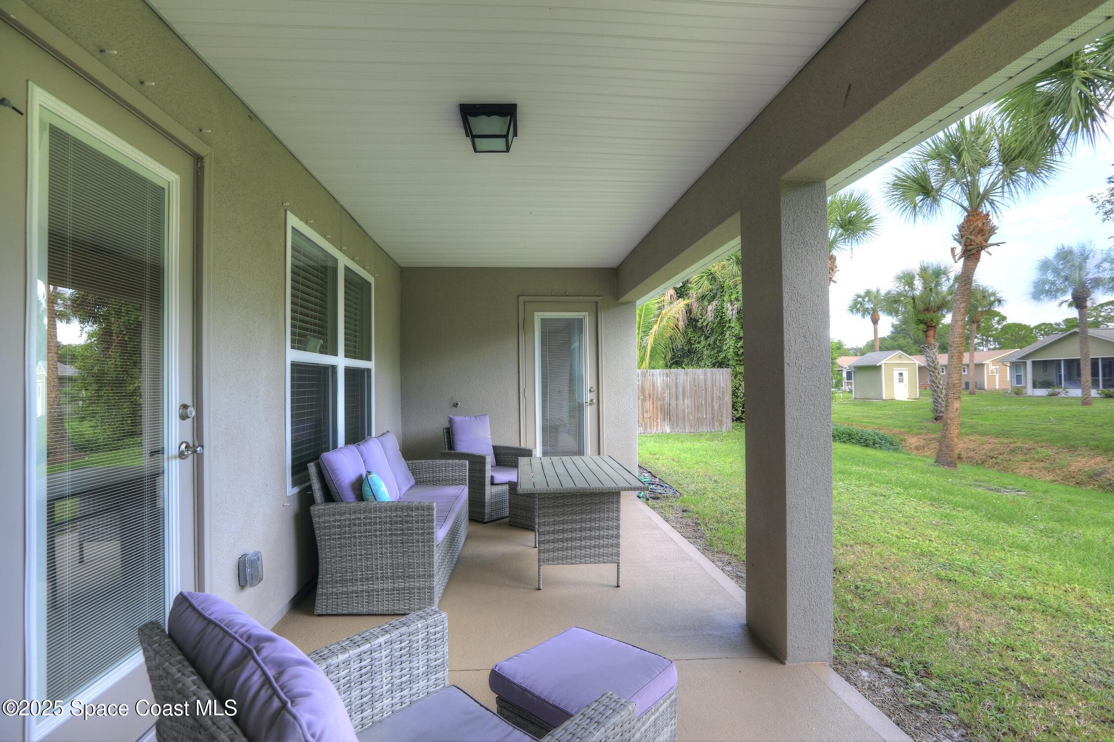 443 Lanfair Avenue Sebastian, FL 32958 - Photo 25 of 33 a lobby with furniture and garden view