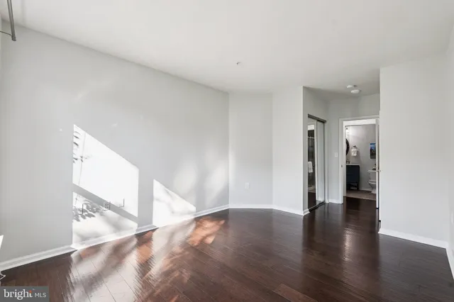 a view of an entryway with wooden floor