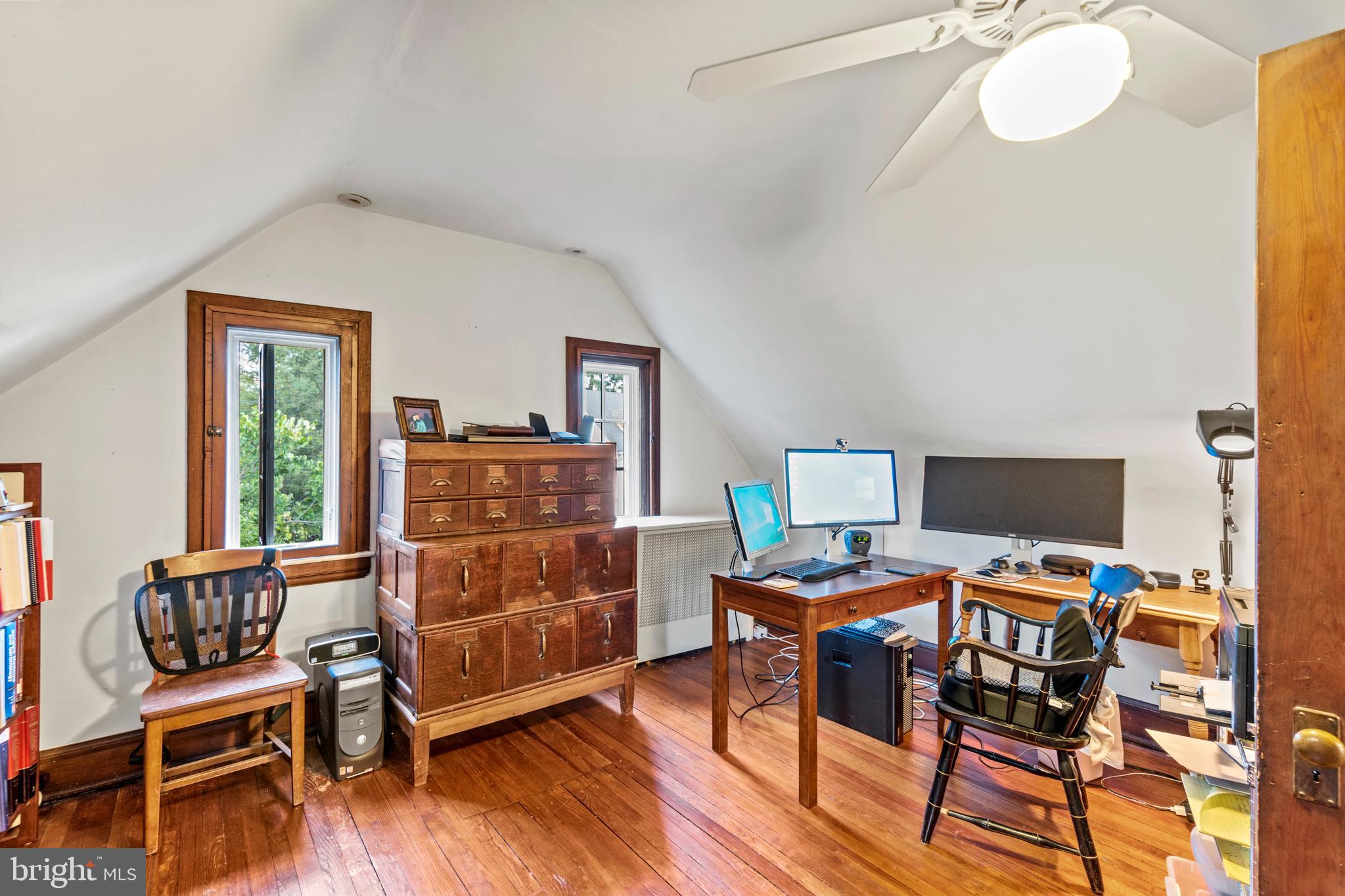 317 Hawthorn Road Baltimore, MD 21210 - Photo 41 of 59 3rd floor bedroom #3 w/ wood floors & ceiling fan