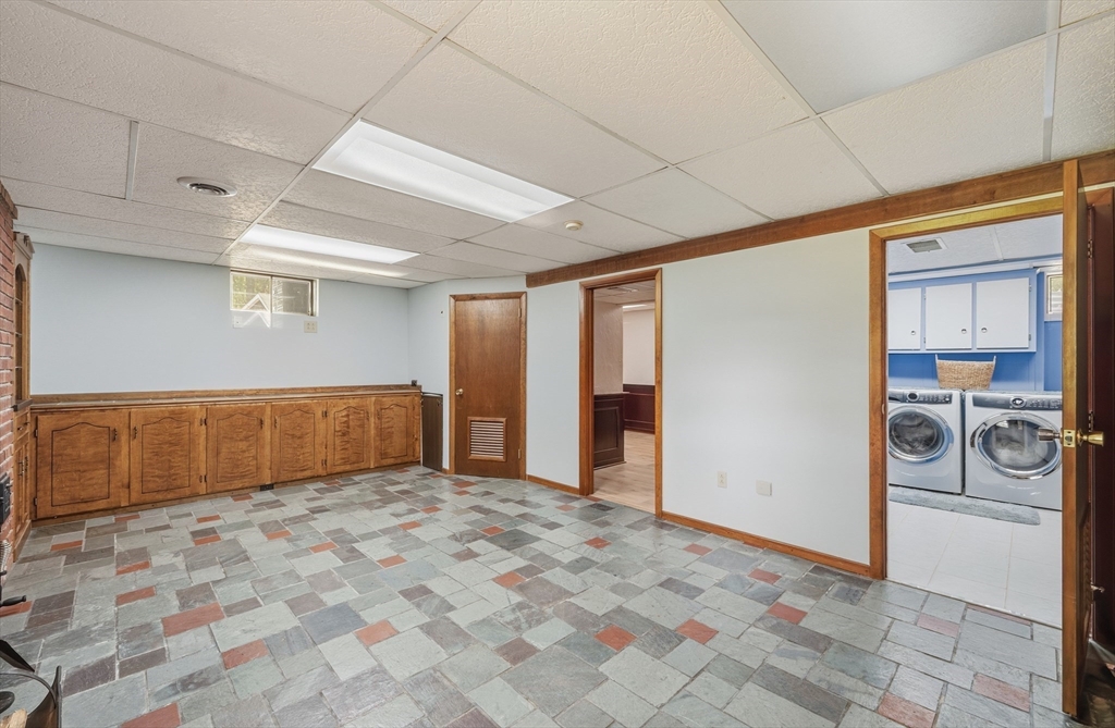43 Flint Road Tyngsborough, MA 01879 - Photo 25 of 40 a view of a livingroom with an empty space