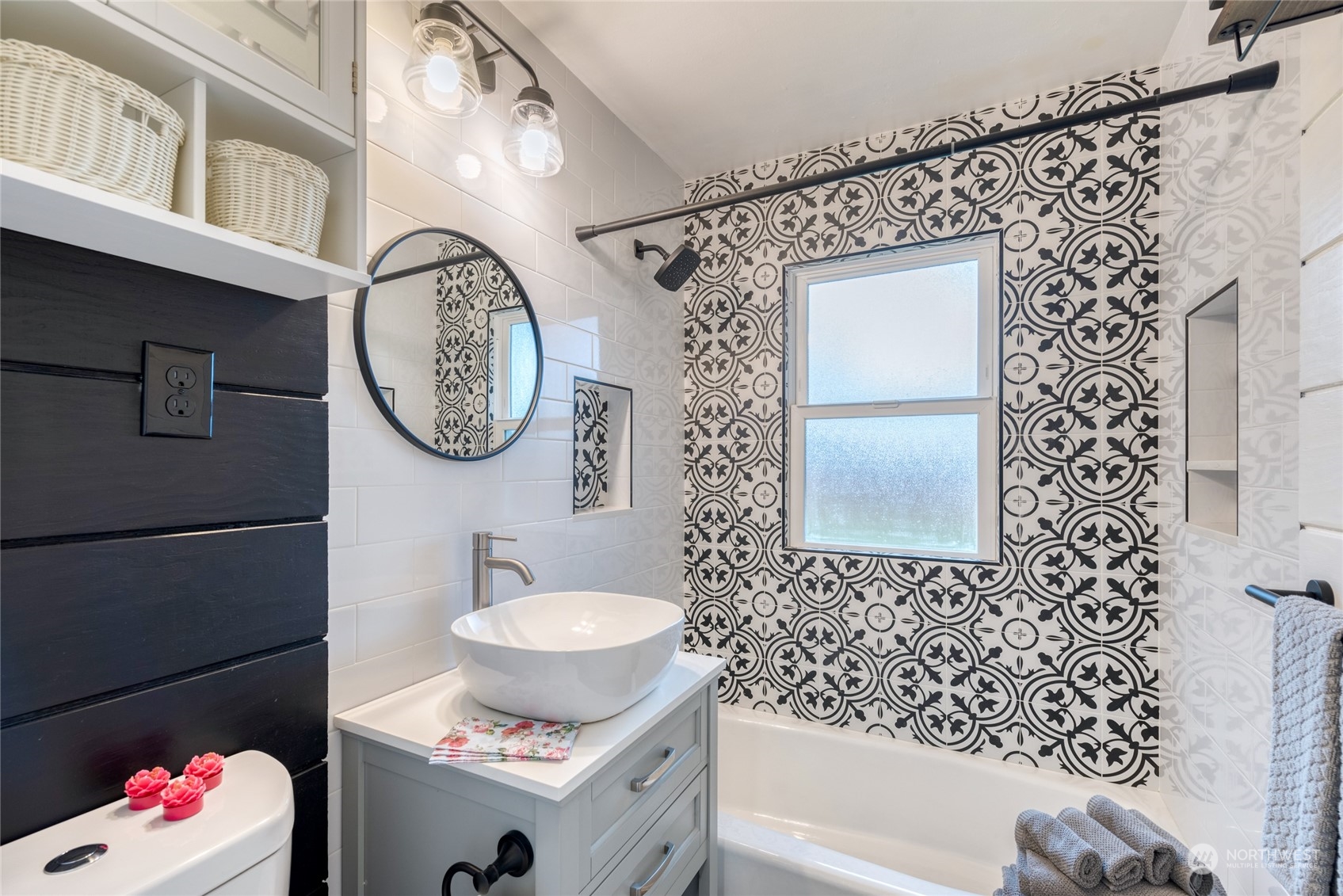 3915 Southwest Rose Street Seattle, WA 98136 - Photo 15 of 25 a bathroom with a sink and a mirror