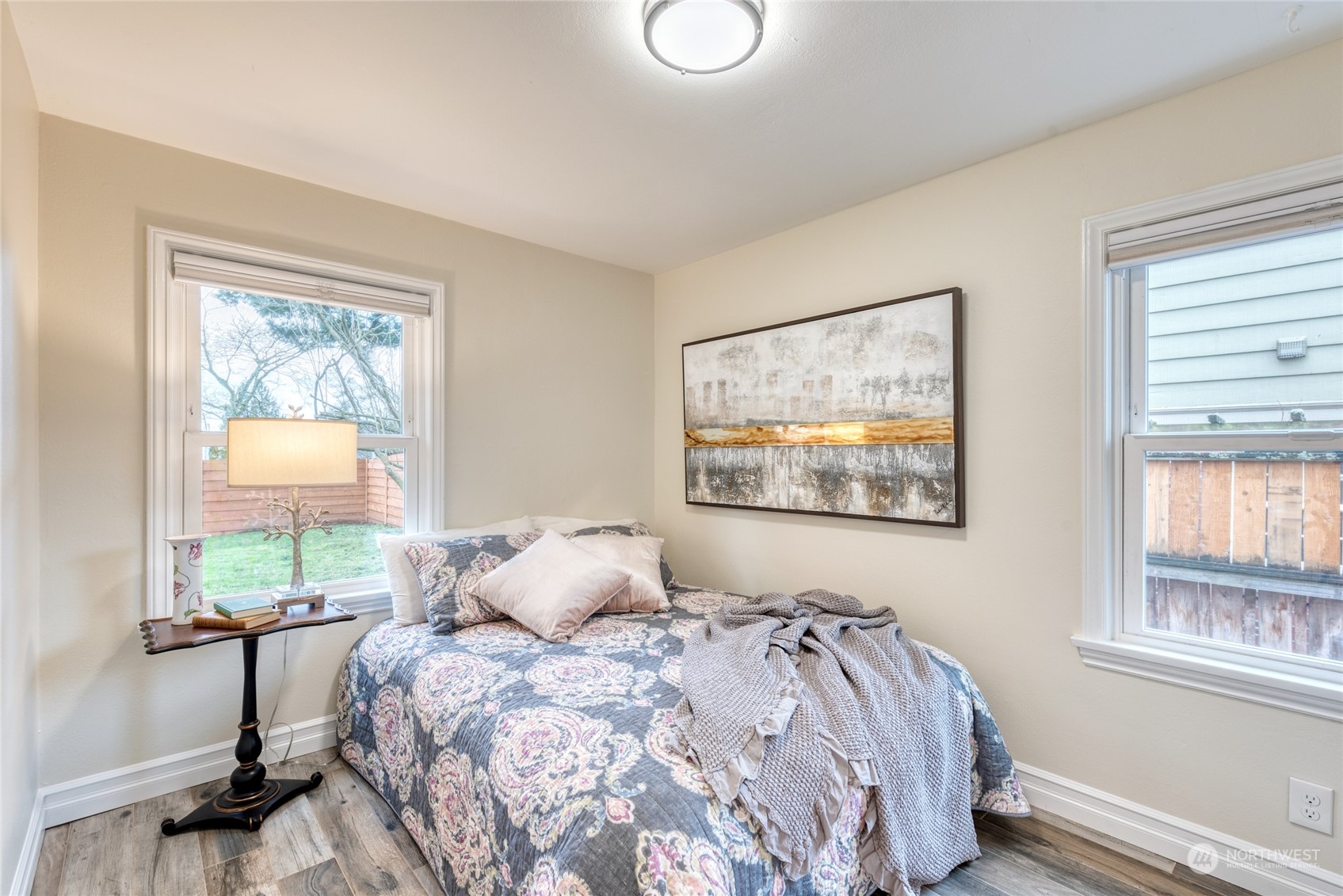 3915 Southwest Rose Street Seattle, WA 98136 - Photo 17 of 25 a bedroom with a bed and a window