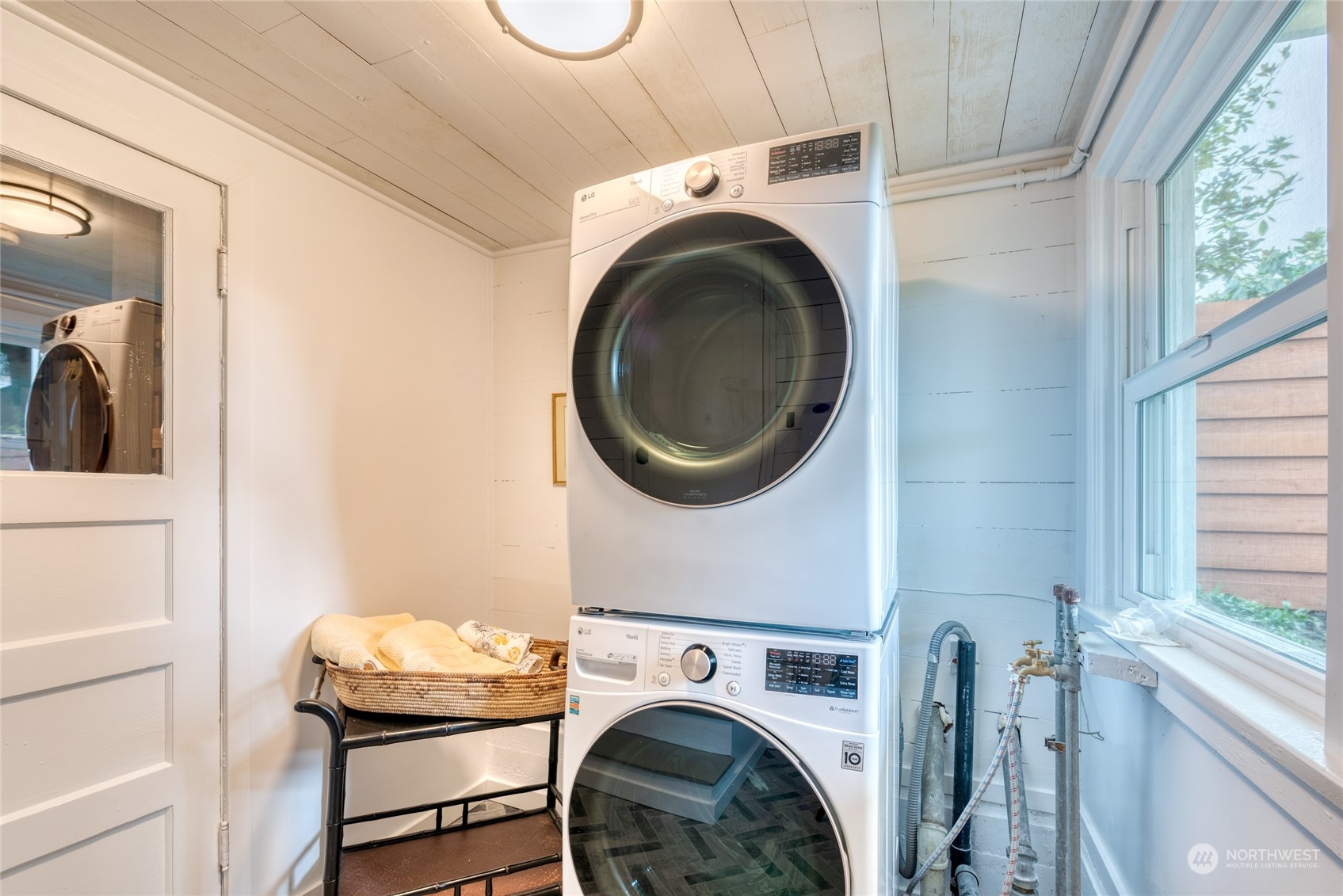 3915 Southwest Rose Street Seattle, WA 98136 - Photo 18 of 25 a utility room with dryer and washer
