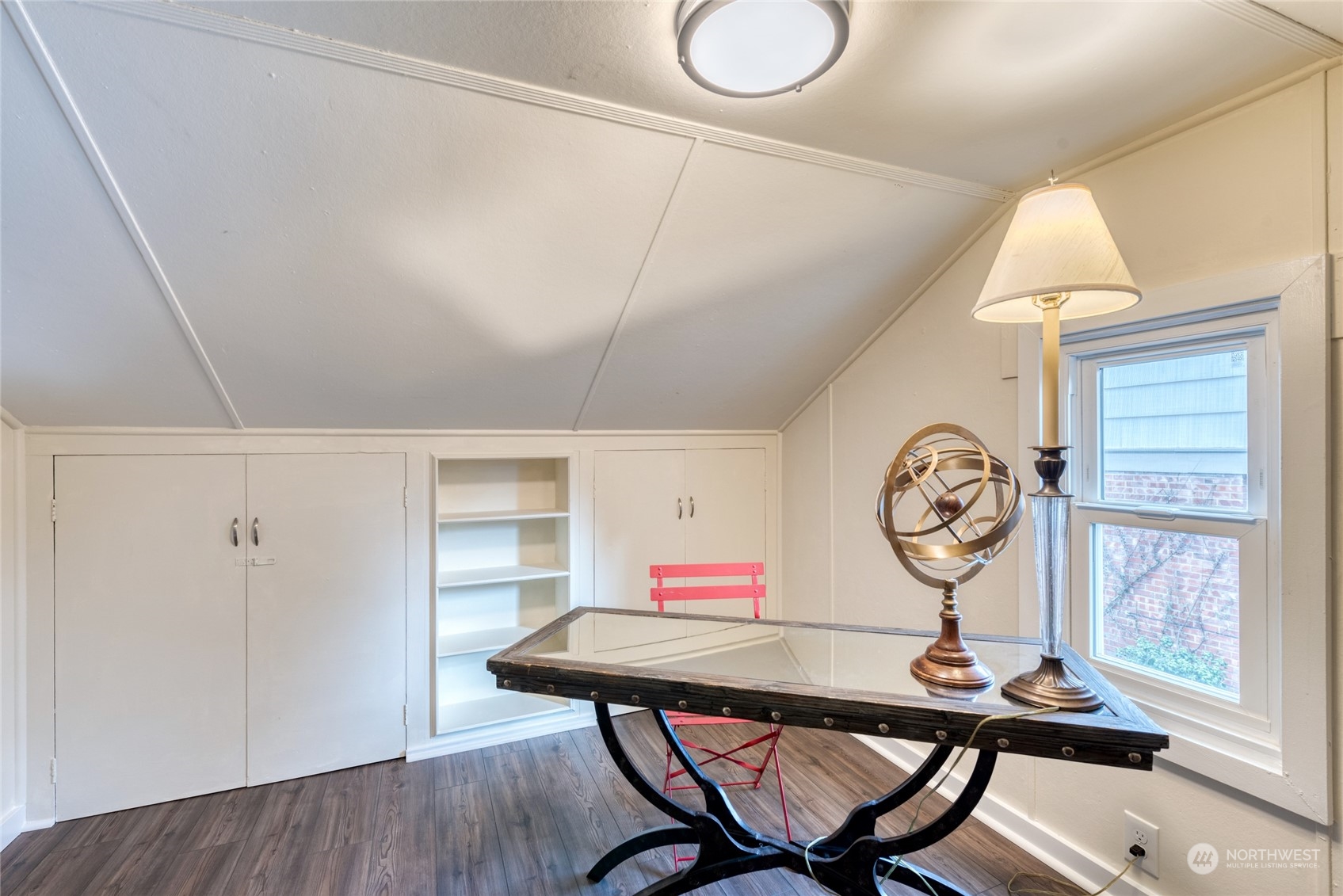 3915 Southwest Rose Street Seattle, WA 98136 - Photo 21 of 25 a view of a dining room with furniture and wooden floor