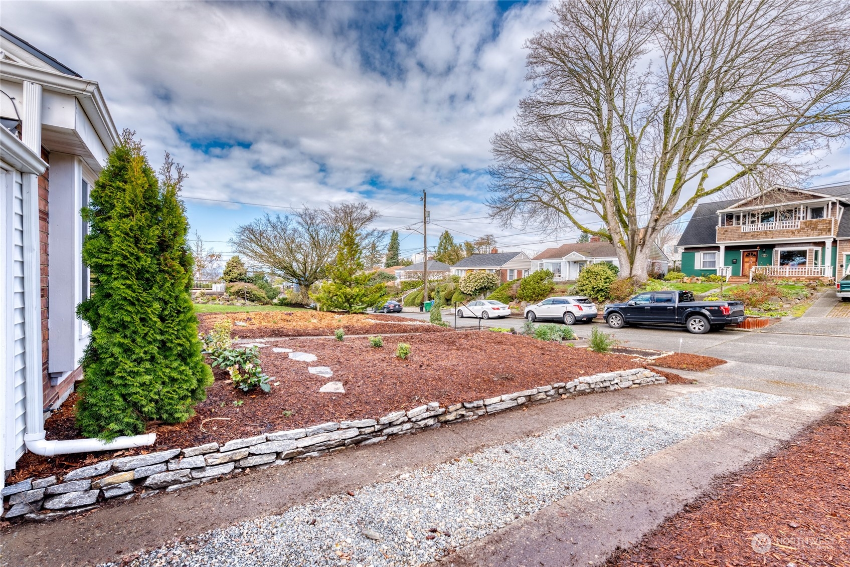 3915 Southwest Rose Street Seattle, WA 98136 - Photo 24 of 25 a view of road with trees