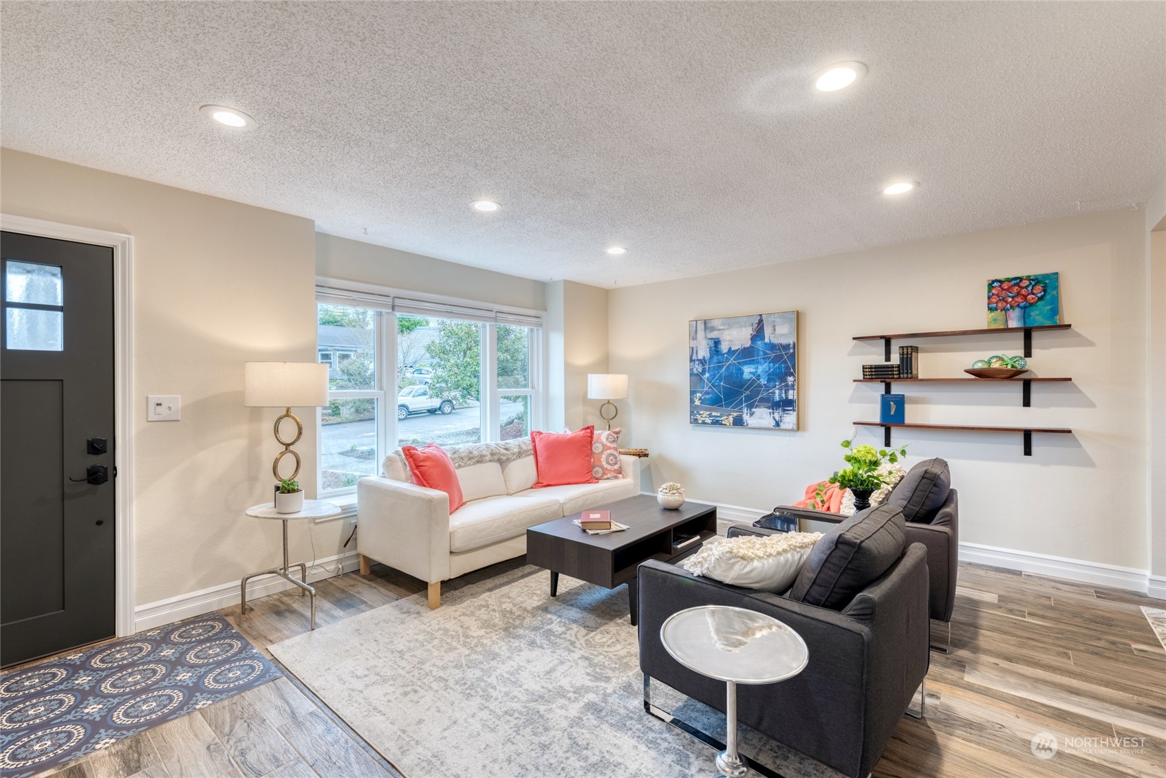 3915 Southwest Rose Street Seattle, WA 98136 - Photo 6 of 25 a living room with furniture and a wooden floor