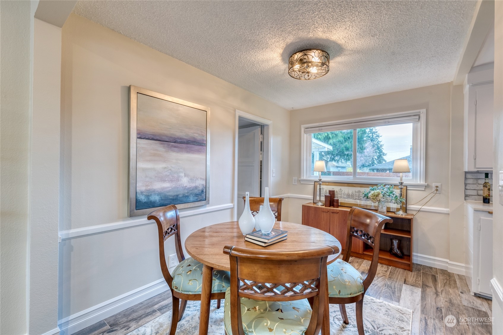 3915 Southwest Rose Street Seattle, WA 98136 - Photo 9 of 25 a view of a dining room with furniture window and outside view