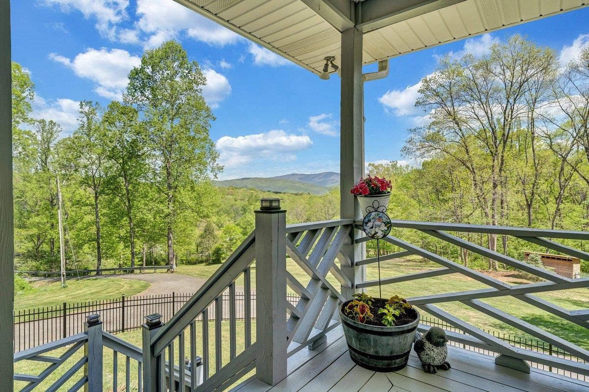 649 Greyledge Road Buchanan, VA 24066 - Photo 14 of 75 a view of a balcony with chairs