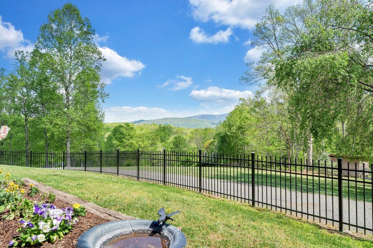 649 Greyledge Road Buchanan, VA 24066 - Photo 26 of 75 a view of a backyard with a garden