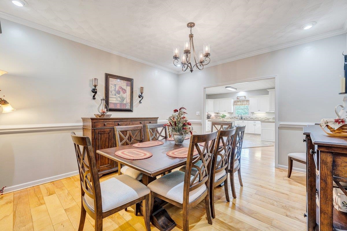 649 Greyledge Road Buchanan, VA 24066 - Photo 40 of 75 a view of a dining room with furniture and wooden floor