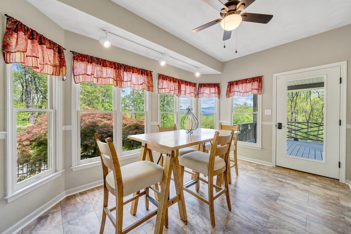 649 Greyledge Road Buchanan, VA 24066 - Photo 43 of 75 a view of a dining room with furniture window and wooden floor