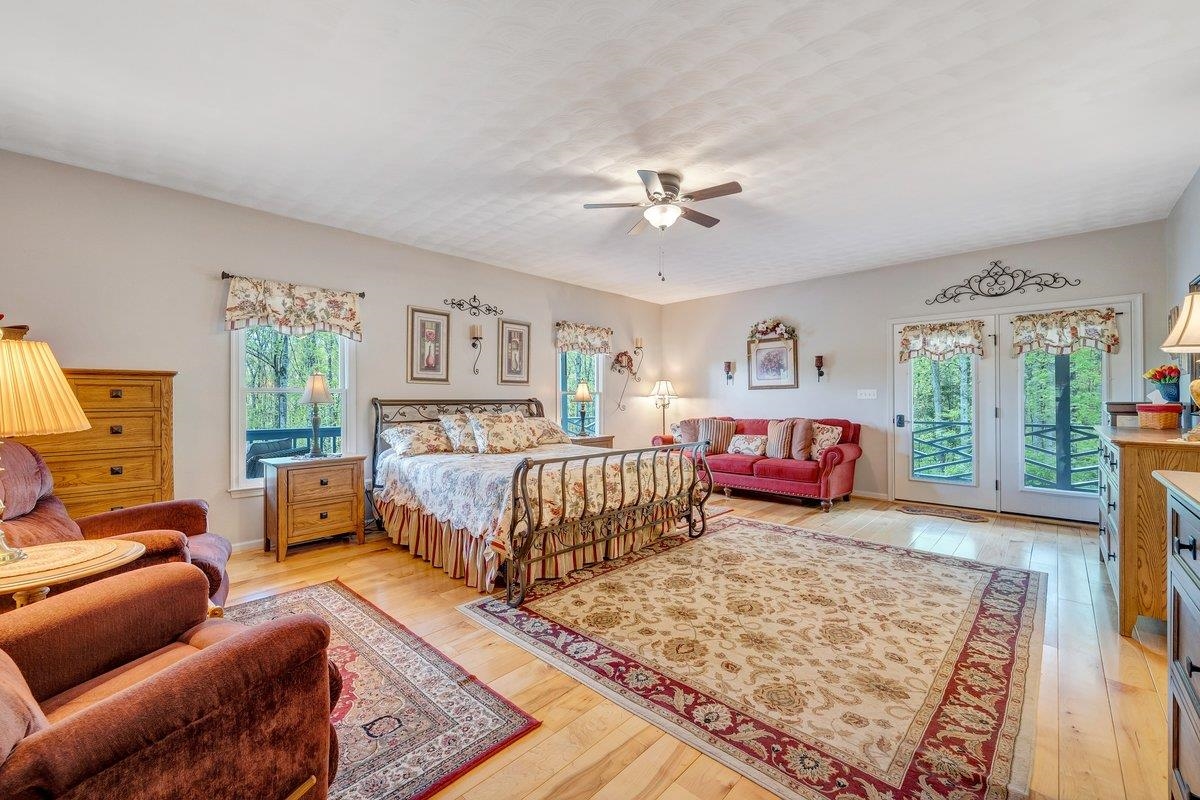 649 Greyledge Road Buchanan, VA 24066 - Photo 45 of 75 a bedroom with a bed couch and a window