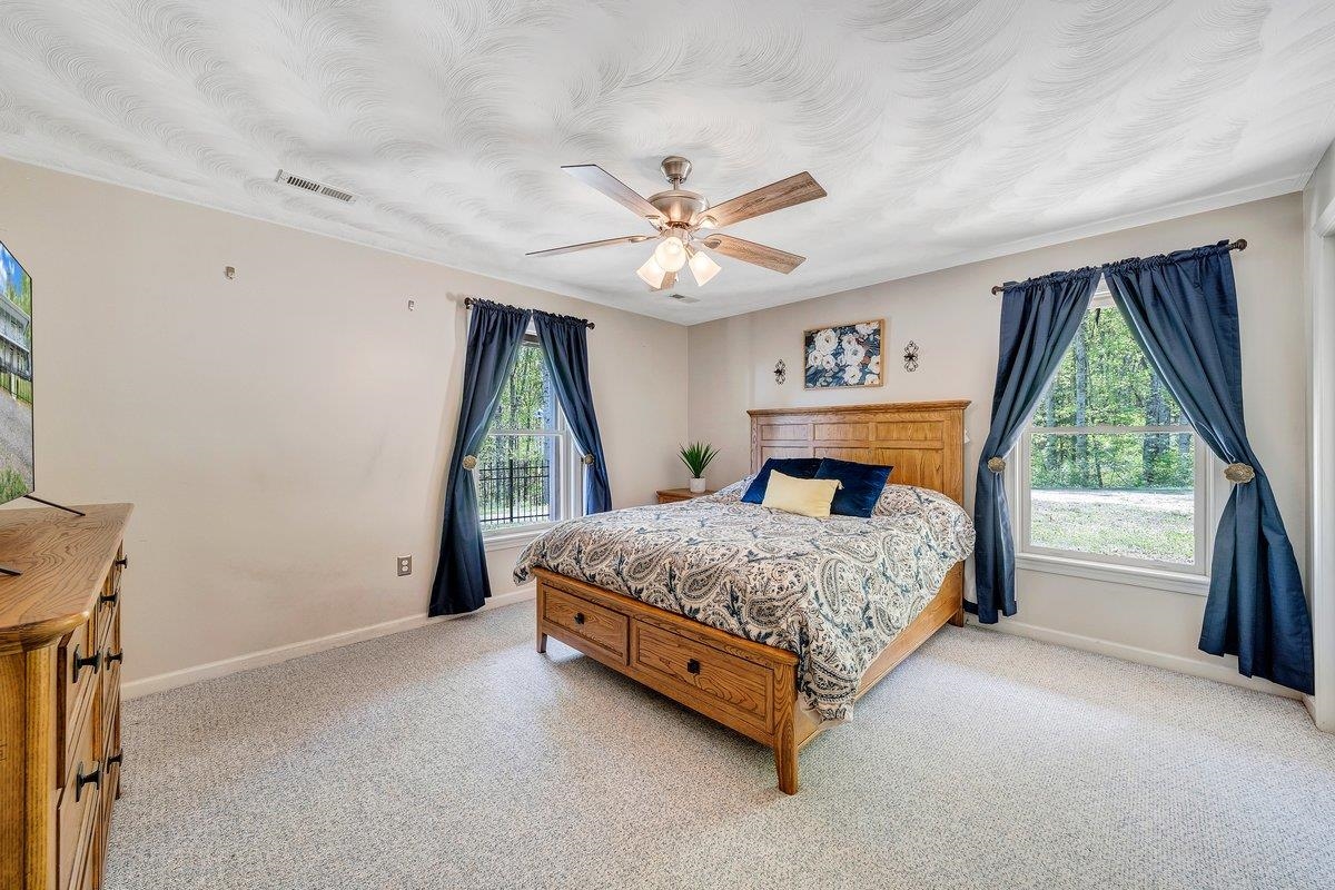 649 Greyledge Road Buchanan, VA 24066 - Photo 63 of 75 a bed sitting in a room next to a window