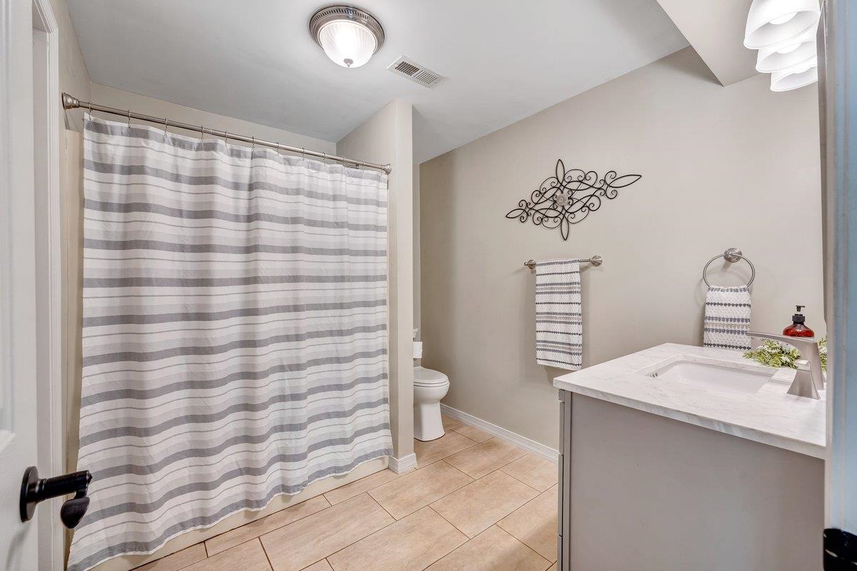 649 Greyledge Road Buchanan, VA 24066 - Photo 65 of 75 a bathroom with a sink a toilet and shower