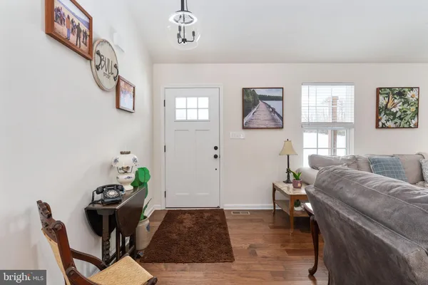 a living room with furniture and window