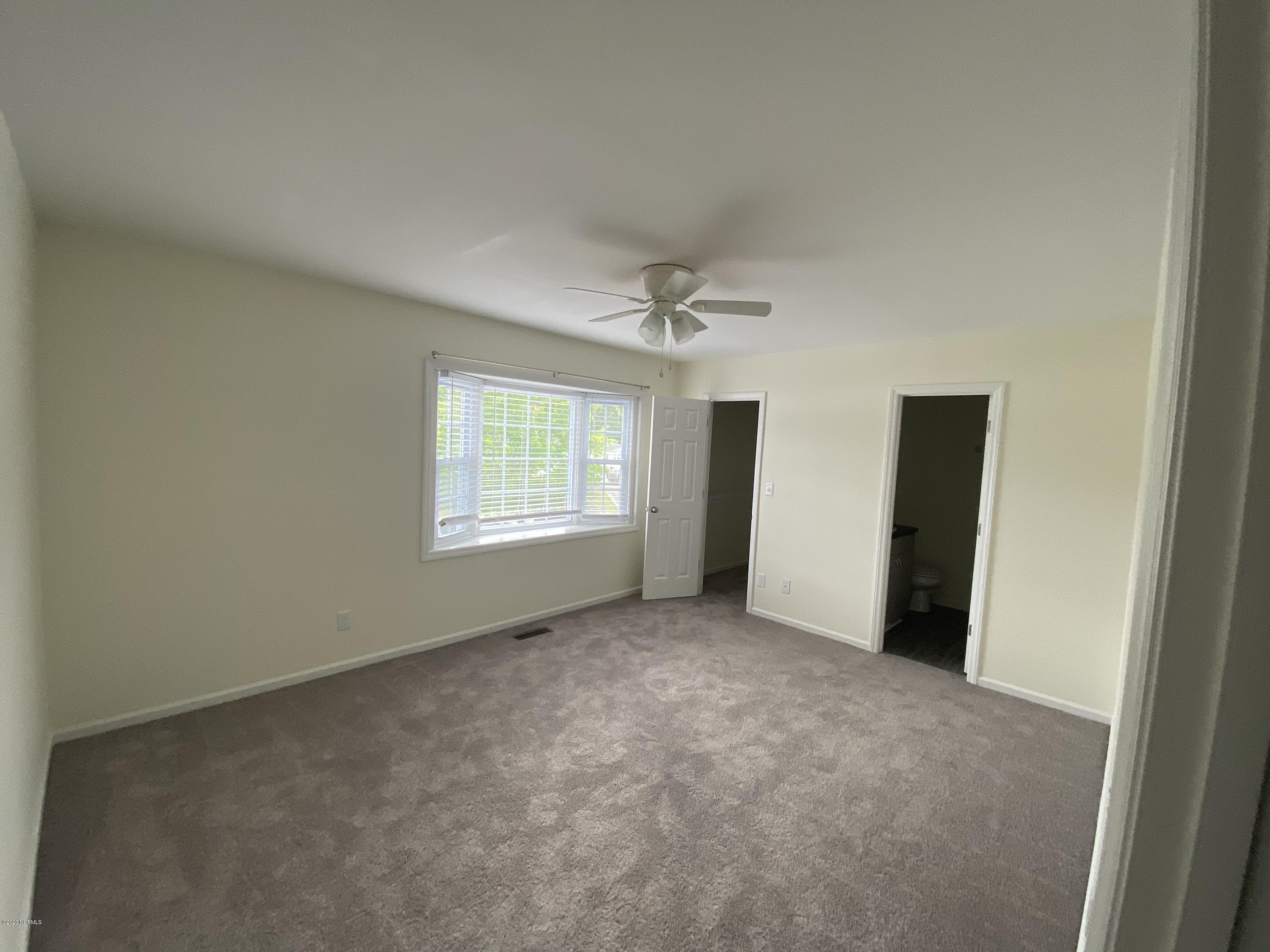 900 Spring Forest Road, Unit J7 Greenville, NC 27834 - Photo 5 of 8 Master Bedroom
