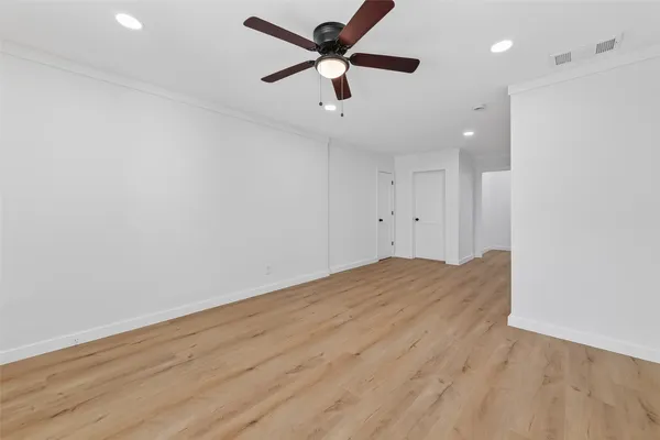 a kitchen with stainless steel appliances granite countertop a sink a stove and a microwave