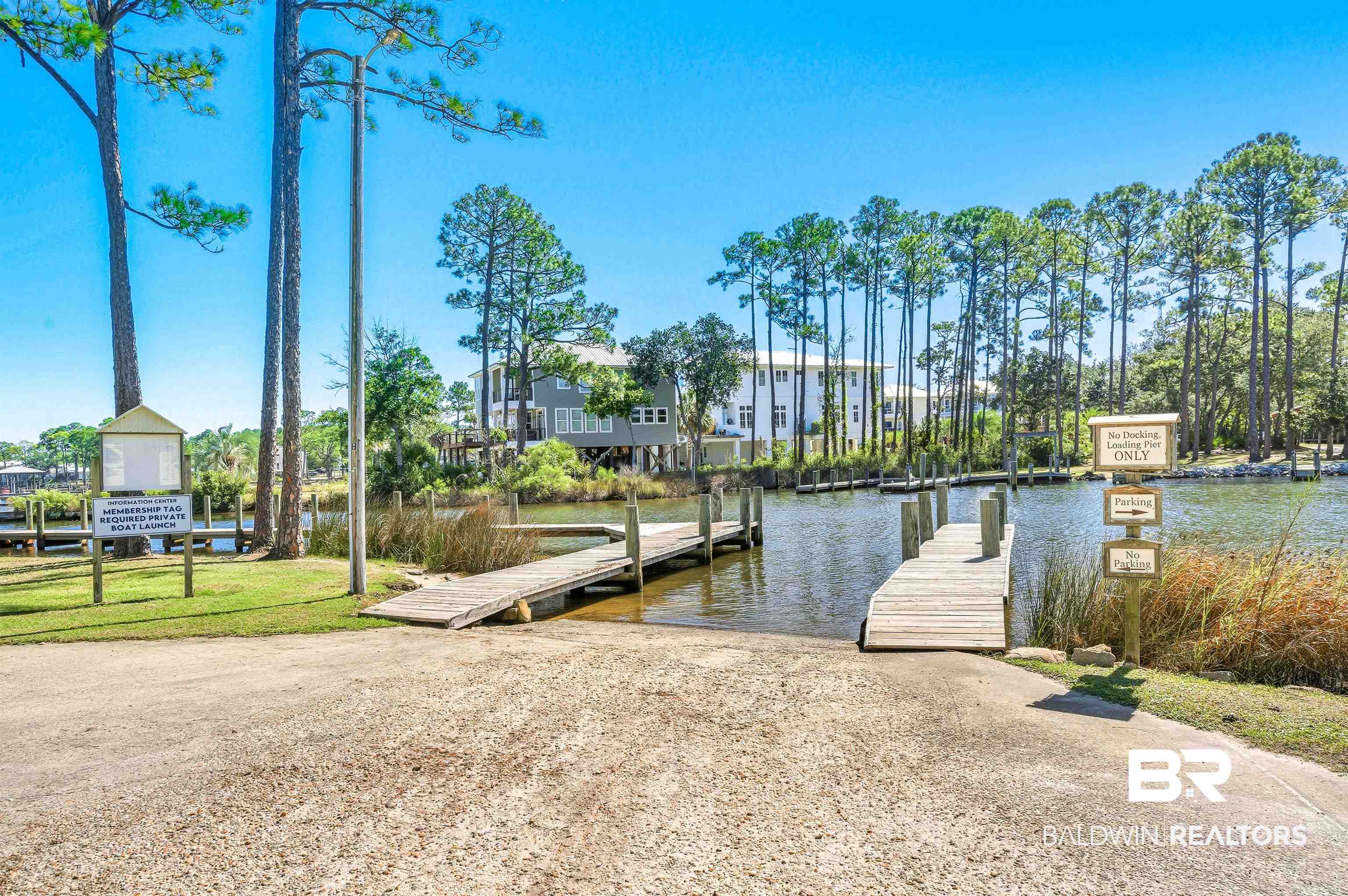 5310 Pine Road Orange Beach, AL 36561 - Photo 24 of 46 Dock with a boat ramp and a water view