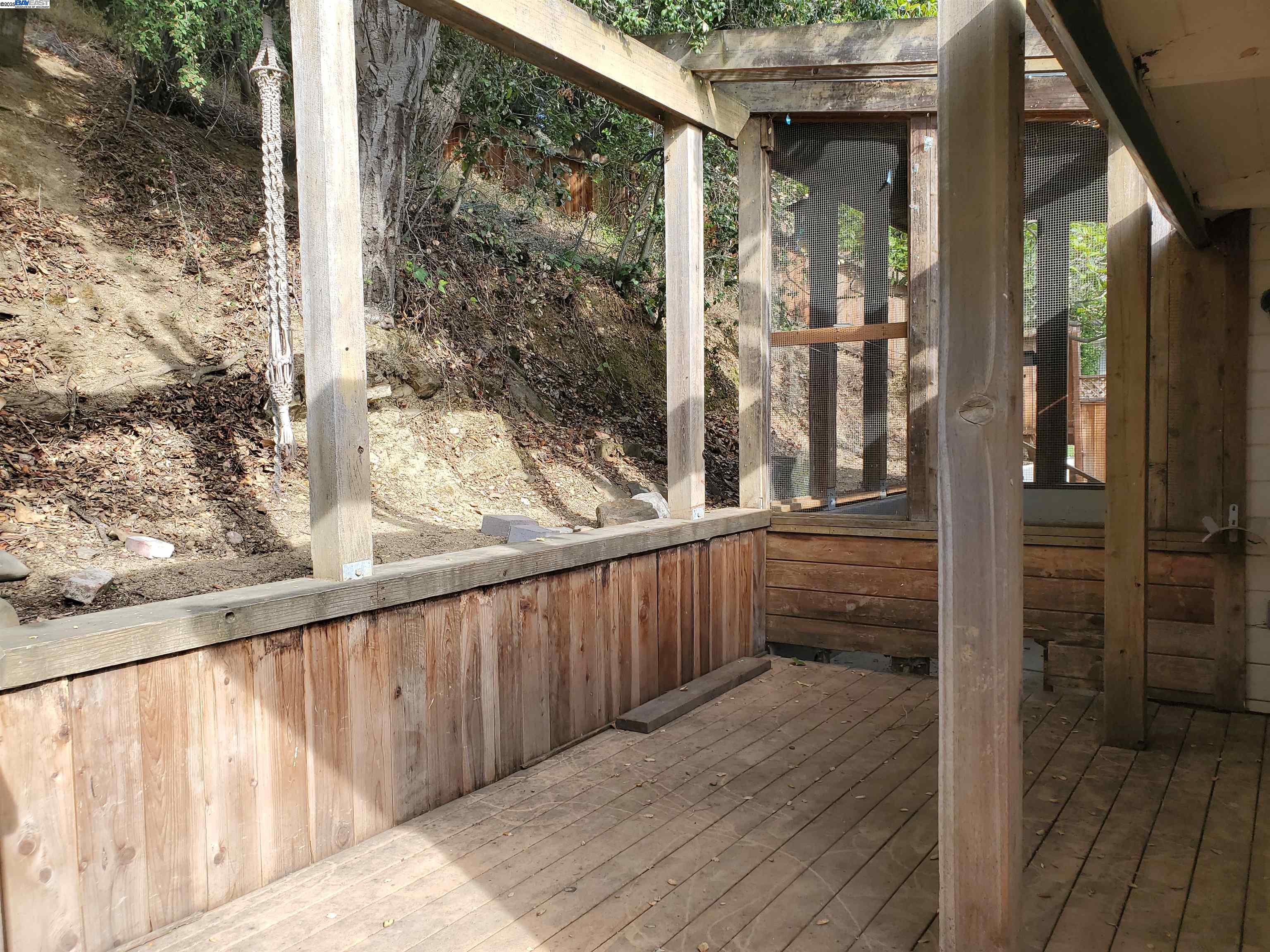 18425 Joseph Drive Castro Valley, CA 94546 - Photo 21 of 24 a view of a balcony with wooden floor and iron gate