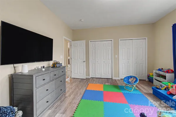 a room with toys and flat screen tv