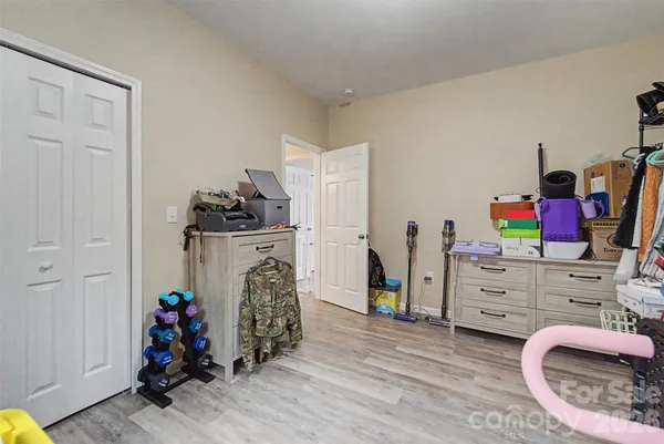 a view of a bedroom with baby toys