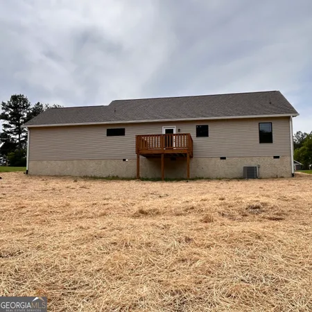 a house with a wooden fence