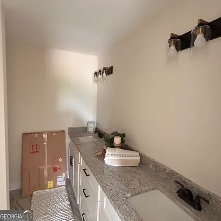 a view of an empty walk in closet