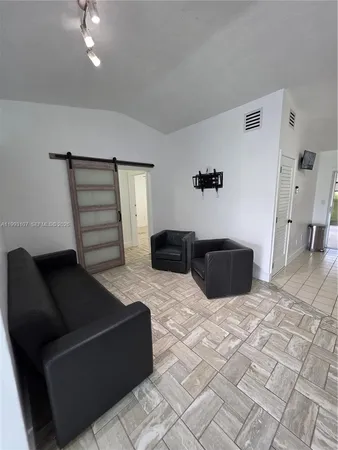 a living room with furniture