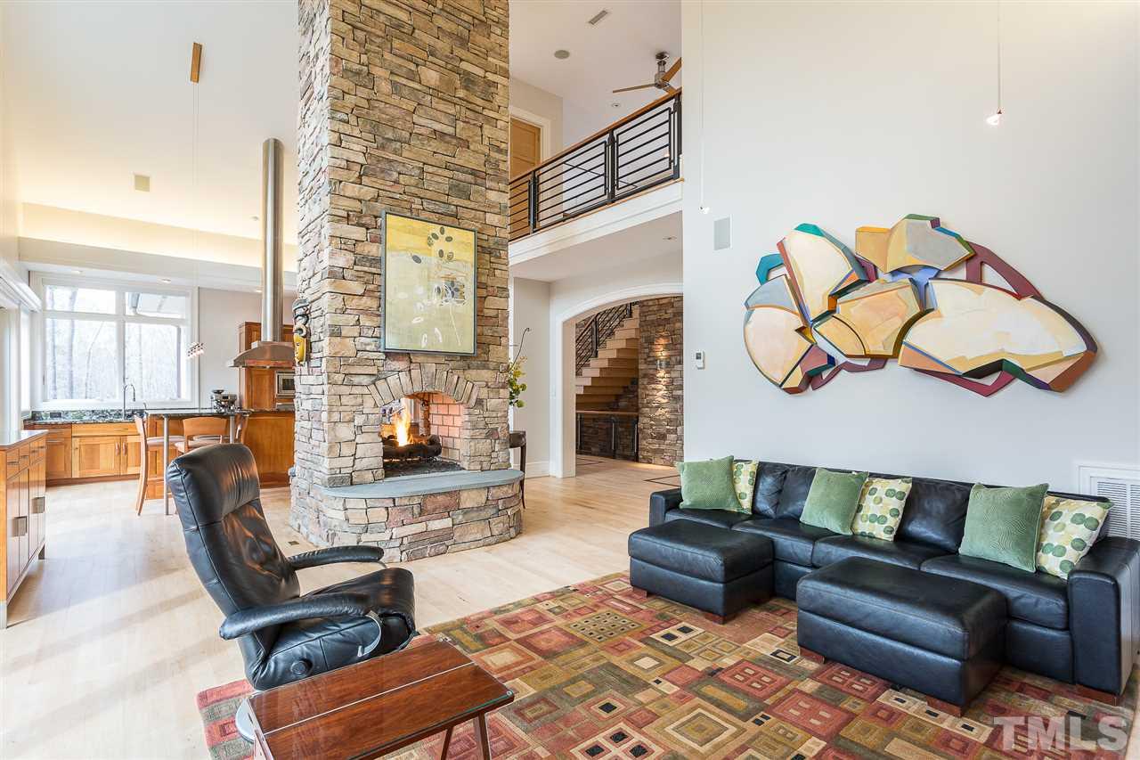 1117 Baslow Brook Court Raleigh, NC 27614 - Photo 14 of 30 a living room with furniture and a fireplace