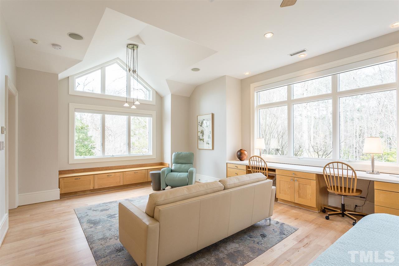 1117 Baslow Brook Court Raleigh, NC 27614 - Photo 24 of 30 a living room with furniture and a large window