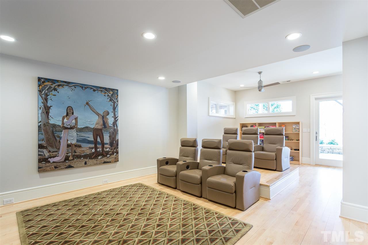 1117 Baslow Brook Court Raleigh, NC 27614 - Photo 29 of 30 a living room with furniture and a rug