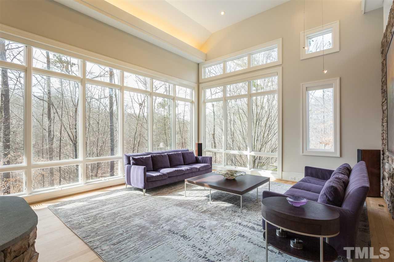 1117 Baslow Brook Court Raleigh, NC 27614 - Photo 8 of 30 a living room with furniture and a large window
