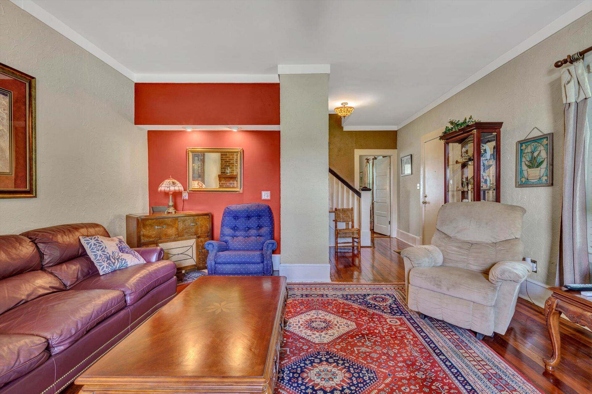 6044 Cove Road Roanoke, VA 24019 - Photo 11 of 67 a living room with furniture and a couch