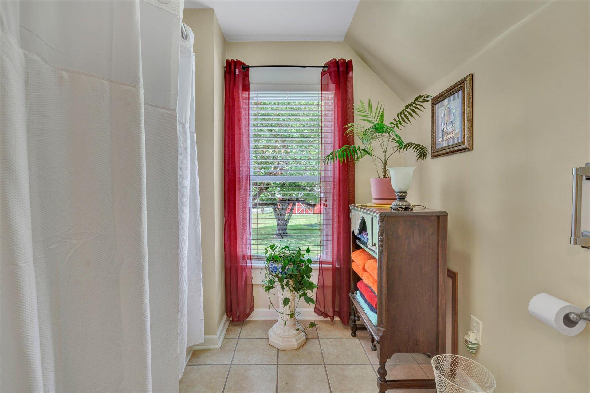 6044 Cove Road Roanoke, VA 24019 - Photo 23 of 67 a living room with furniture and a flat screen tv