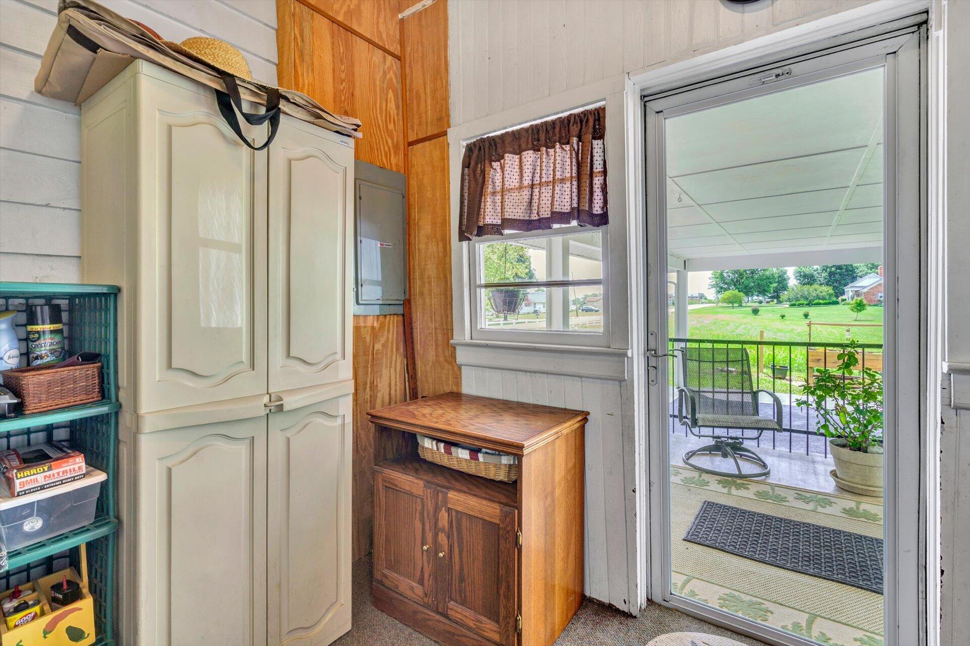 6044 Cove Road Roanoke, VA 24019 - Photo 27 of 67 a kitchen with stainless steel appliances granite countertop a refrigerator and a window