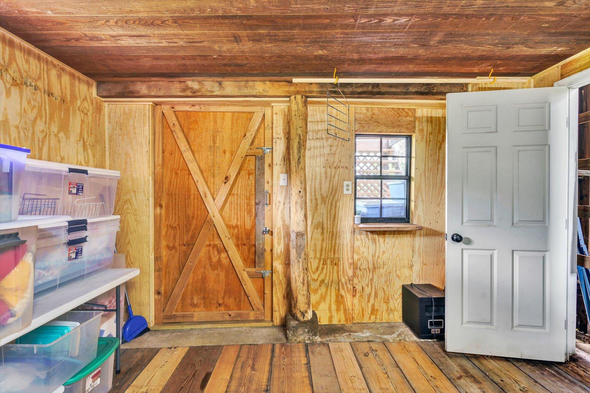 6044 Cove Road Roanoke, VA 24019 - Photo 49 of 67 a view of a room with wooden floor and door