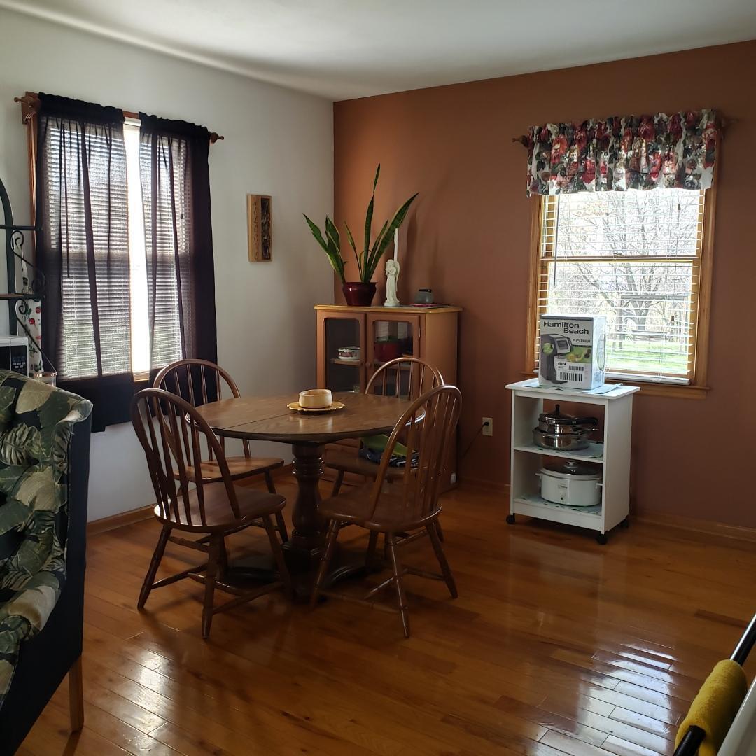 6044 Cove Road Roanoke, VA 24019 - Photo 62 of 67 a dining room with furniture and window