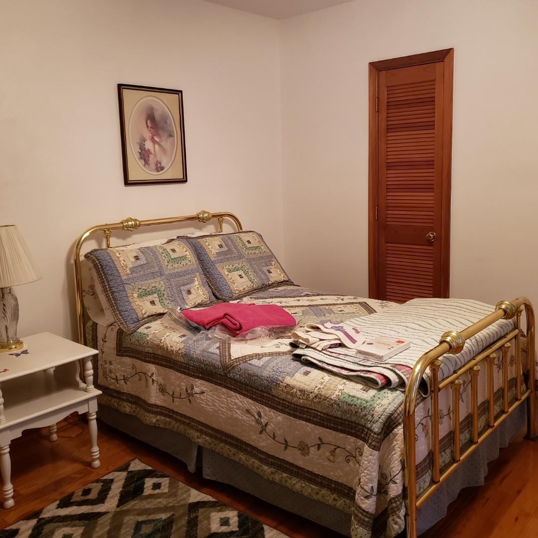 6044 Cove Road Roanoke, VA 24019 - Photo 66 of 67 a bedroom with a bed and a dresser