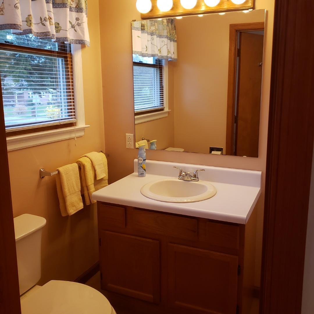 6044 Cove Road Roanoke, VA 24019 - Photo 67 of 67 a bathroom with a sink and a toilet