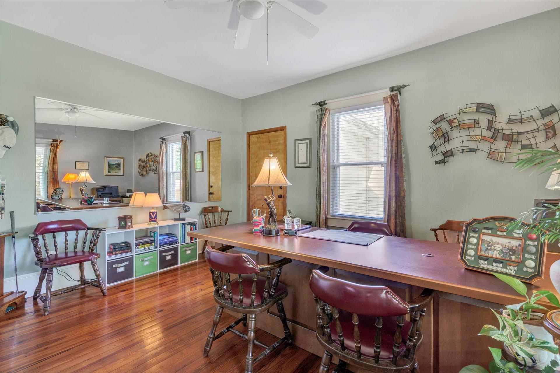 6044 Cove Road Roanoke, VA 24019 - Photo 8 of 67 a view of a dining room with furniture window and wooden floor