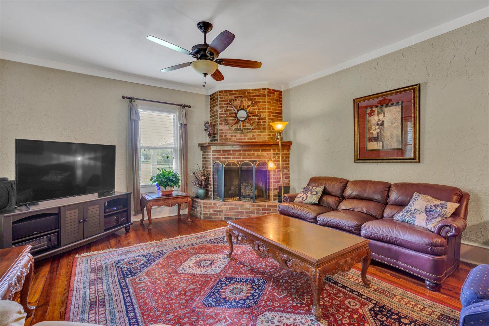 6044 Cove Road Roanoke, VA 24019 - Photo 10 of 67 a living room with furniture and a flat screen tv