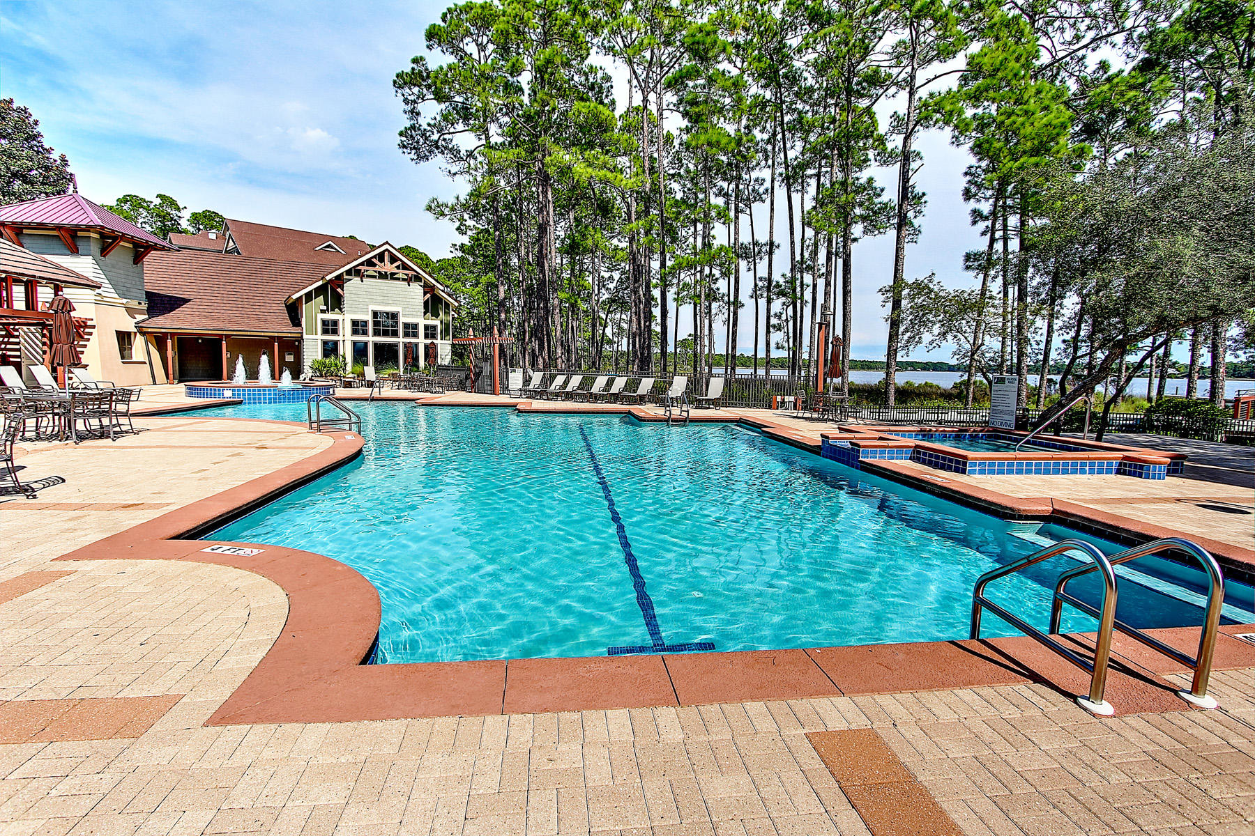 1101 Prospect Promenade, Unit 401 Panama City Beach, FL 32413 - Photo 26 of 35 a view of swimming pool with lounge chair